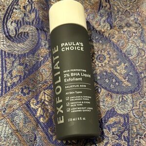 Paula's Choice Black Exfoliant with White Text